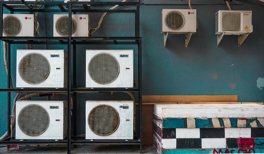 a row of air conditioners in a room.