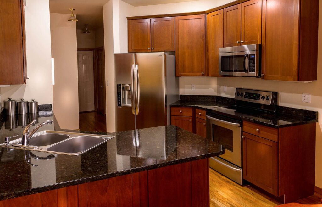 A kitchen with stainless steel appliances.