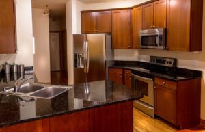 A kitchen with stainless steel appliances.