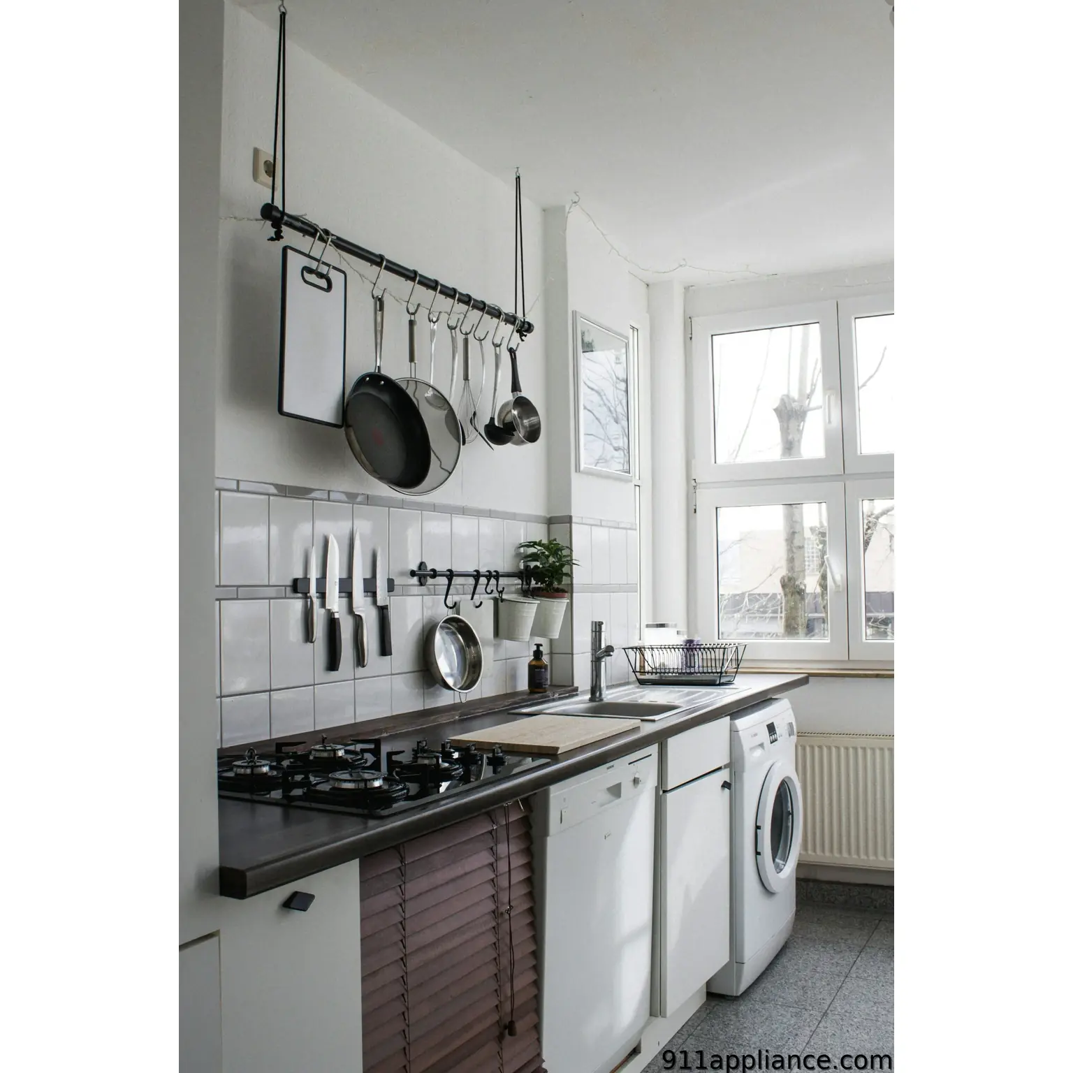 Compact kitchen with hanging pots
