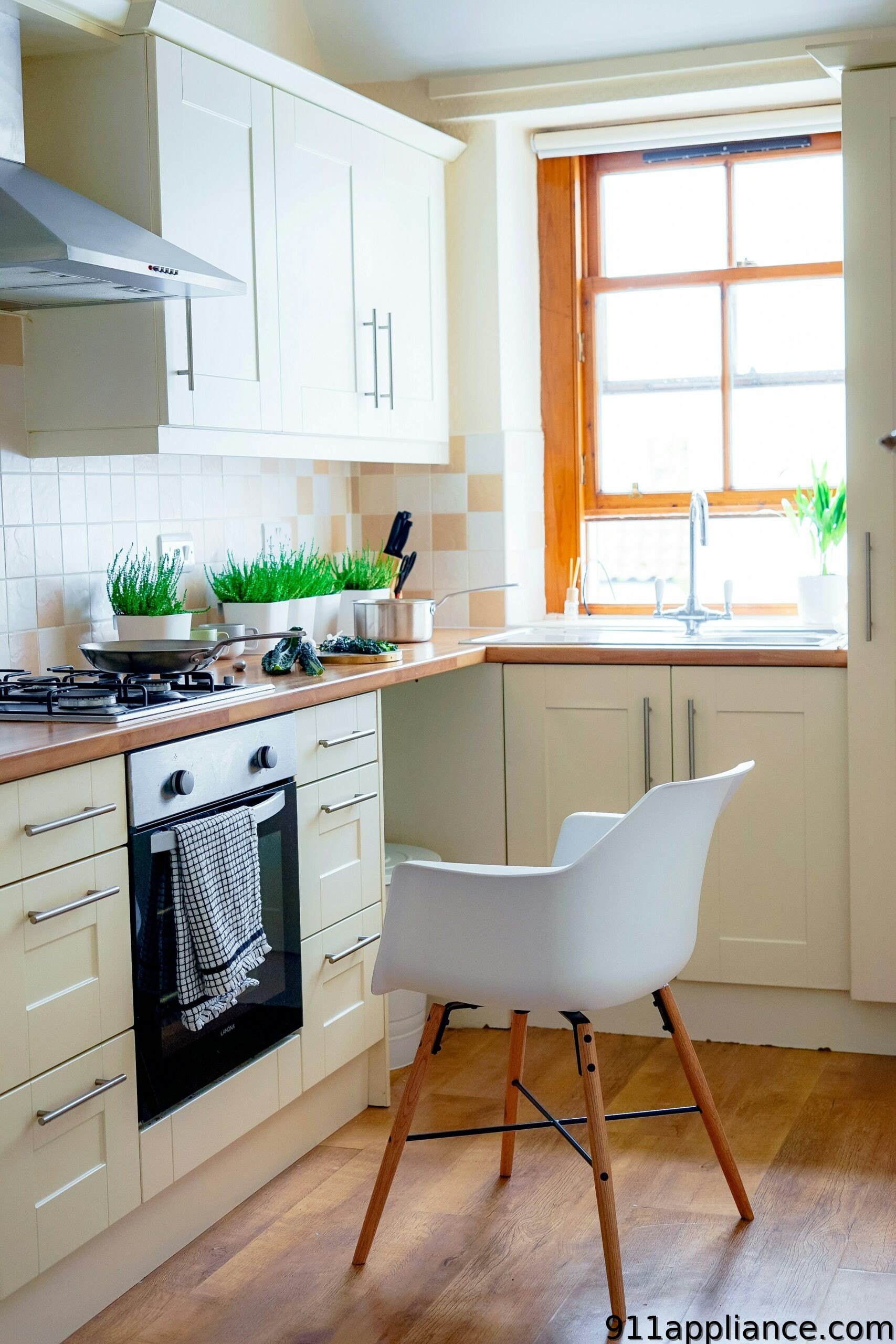 Modern kitchen with white chair.