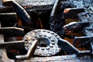 A burnt out burner on a stove.