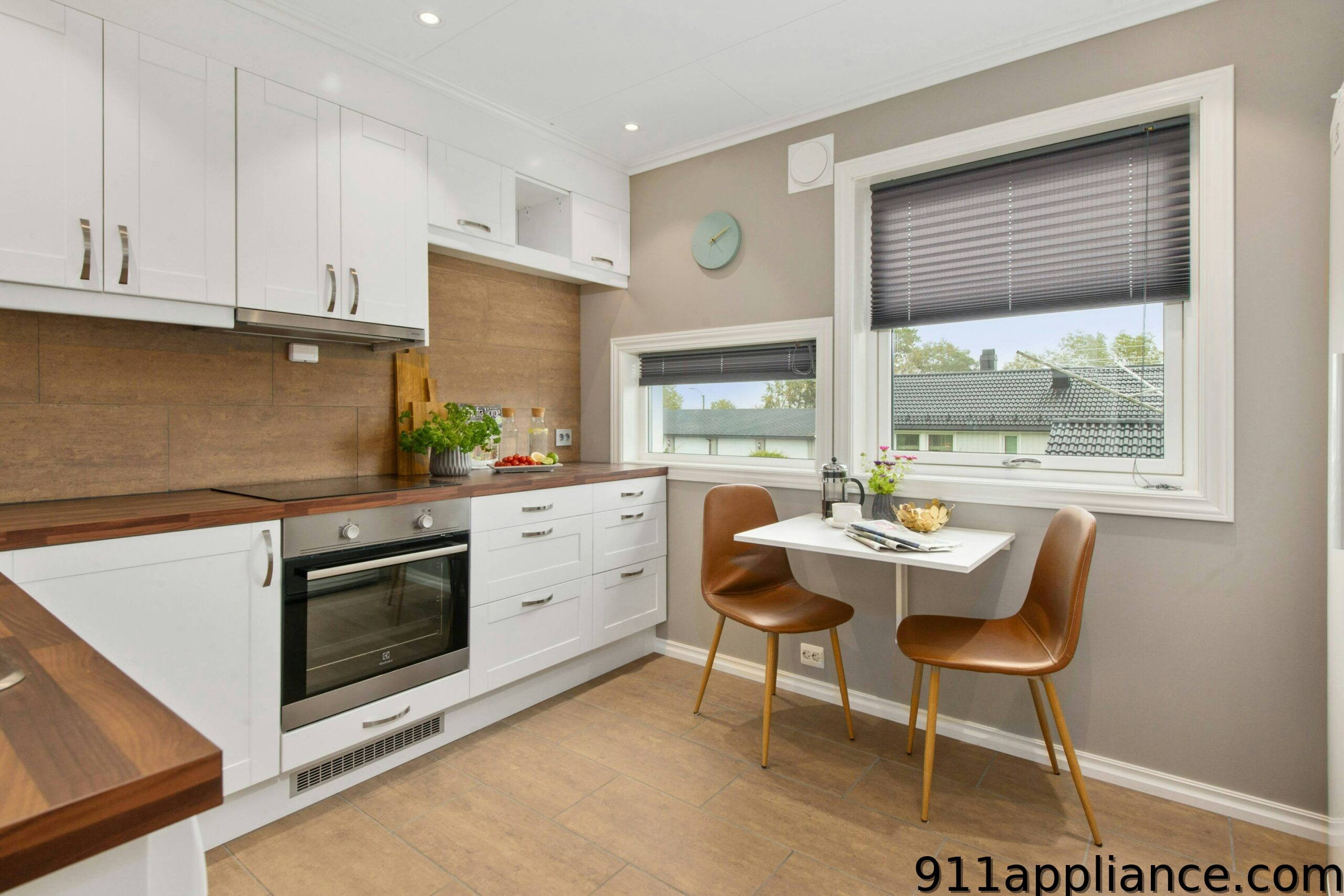 Modern white kitchen with table