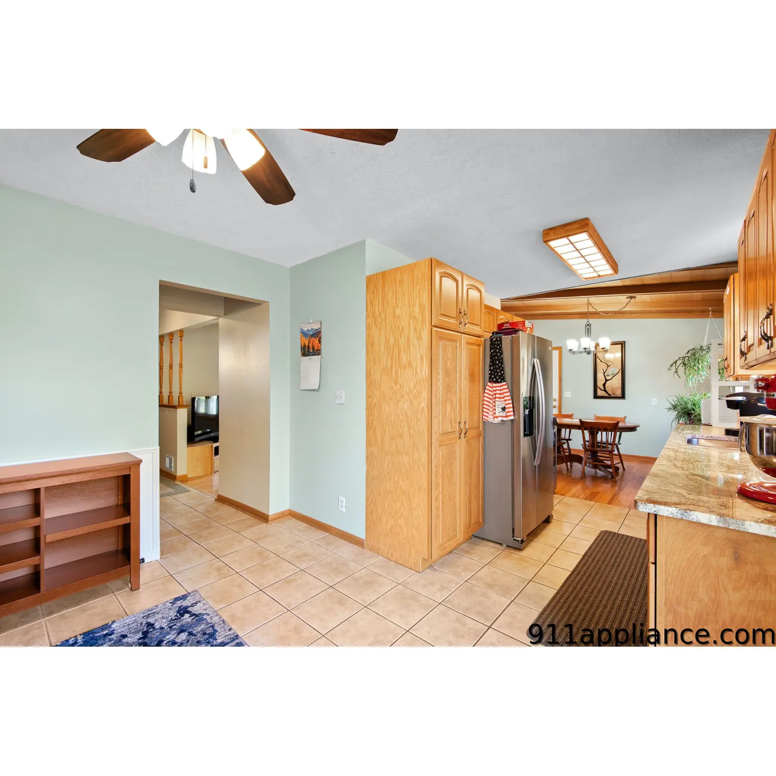 Kitchen with wooden cabinets