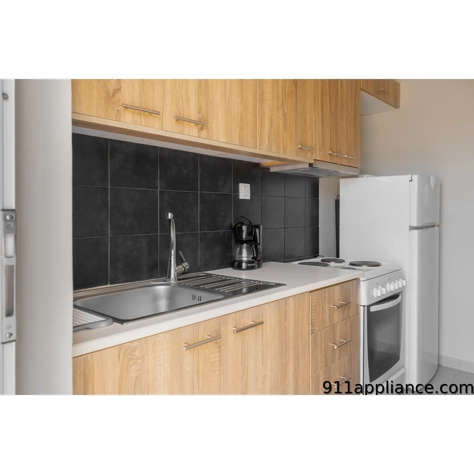 Small kitchen with refrigerator