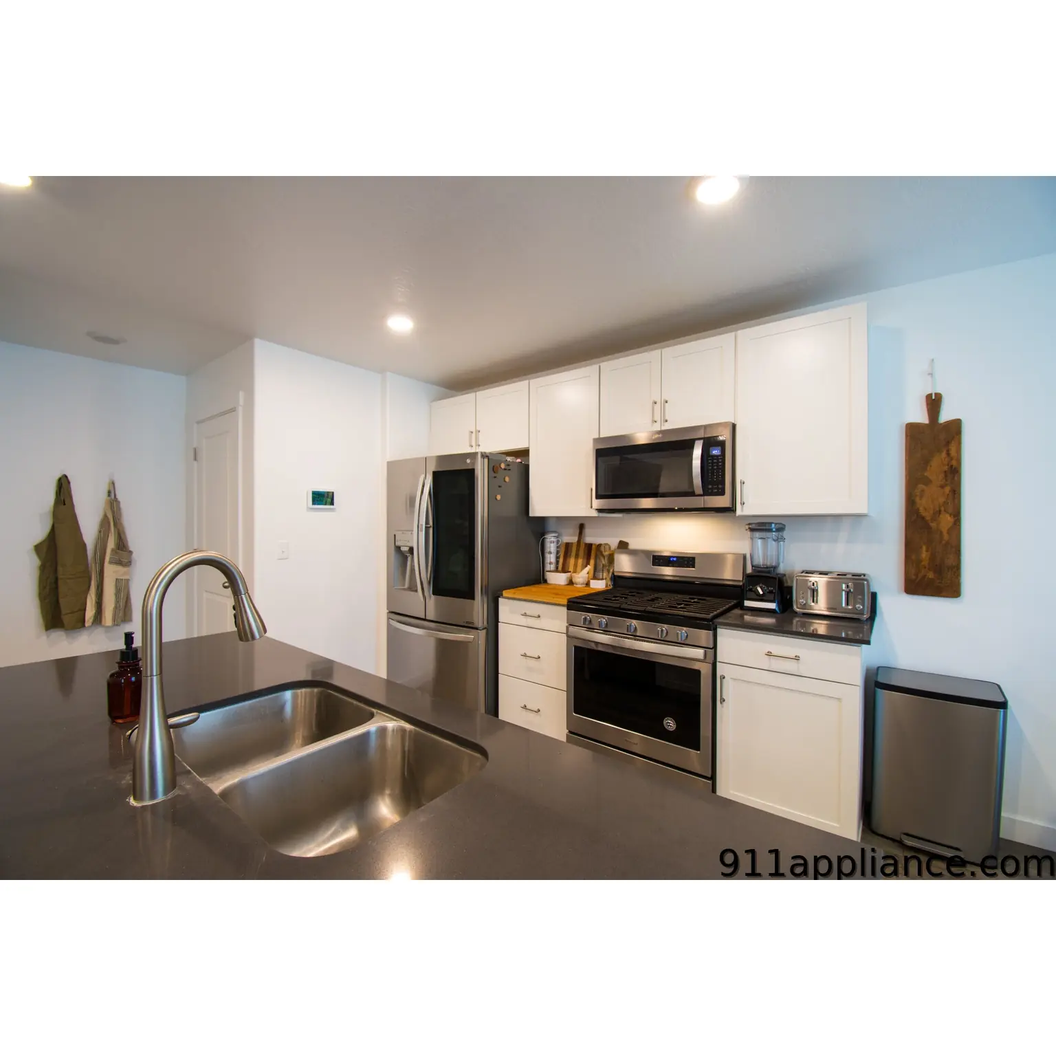 Modern kitchen with stainless steel appliances