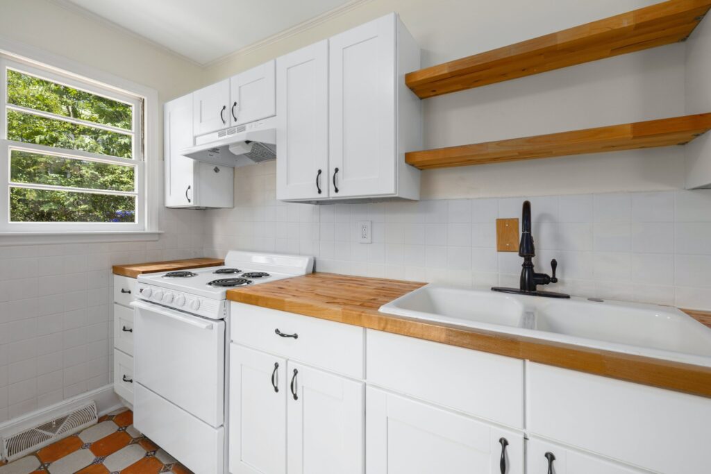 White kitchen with wooden counters