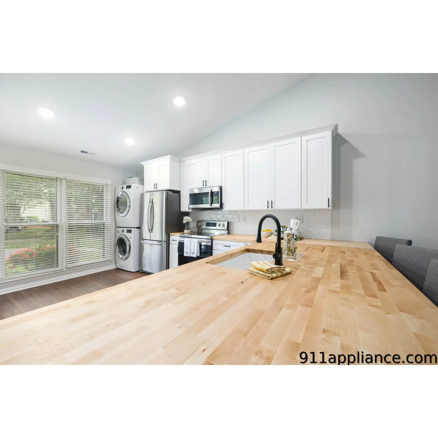 Modern kitchen with white cabinets