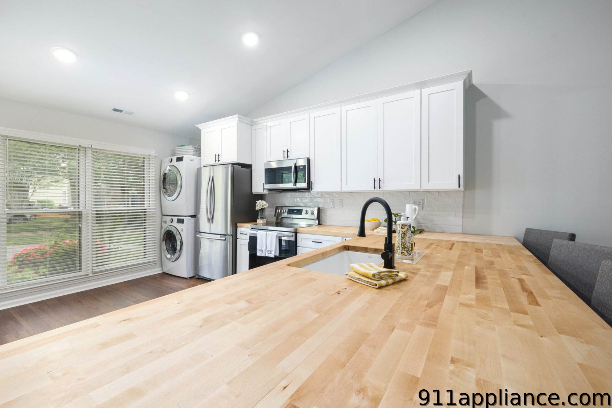 Modern kitchen with white cabinets