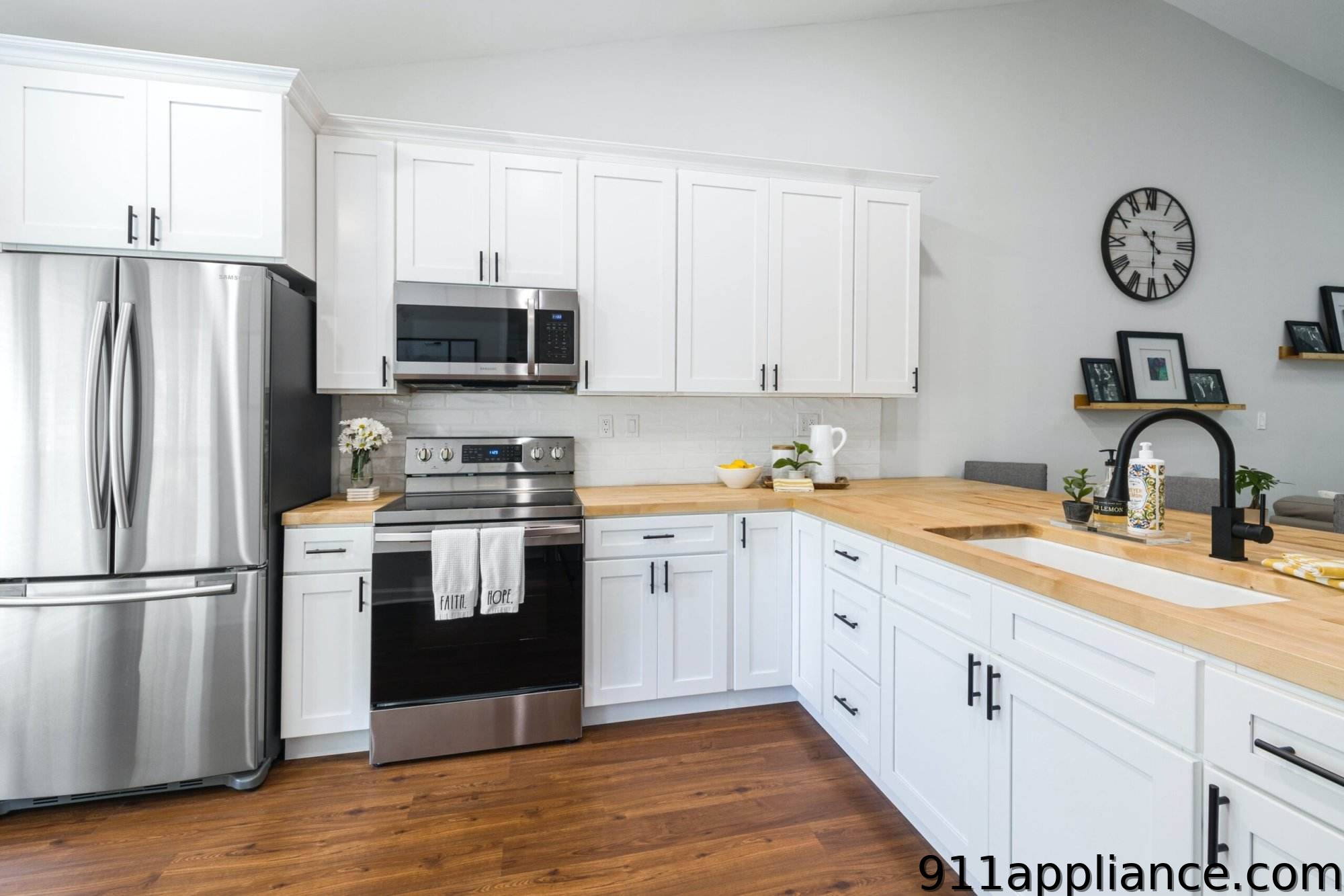 Modern white kitchen with appliances
