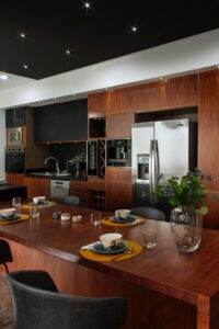 A wooden table in a kitchen.