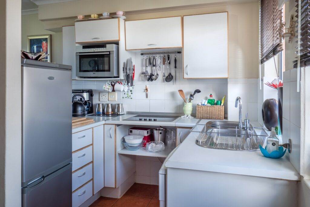 A refrigerator in a kitchen.