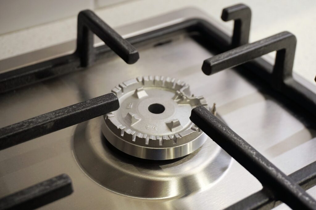 a close up image of a gas stove burner.