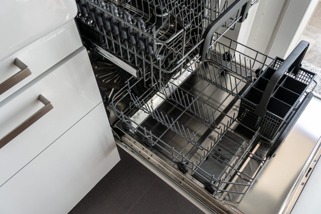 Open dishwasher racks interior view