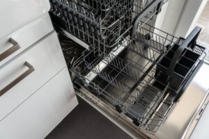 Open dishwasher racks interior view