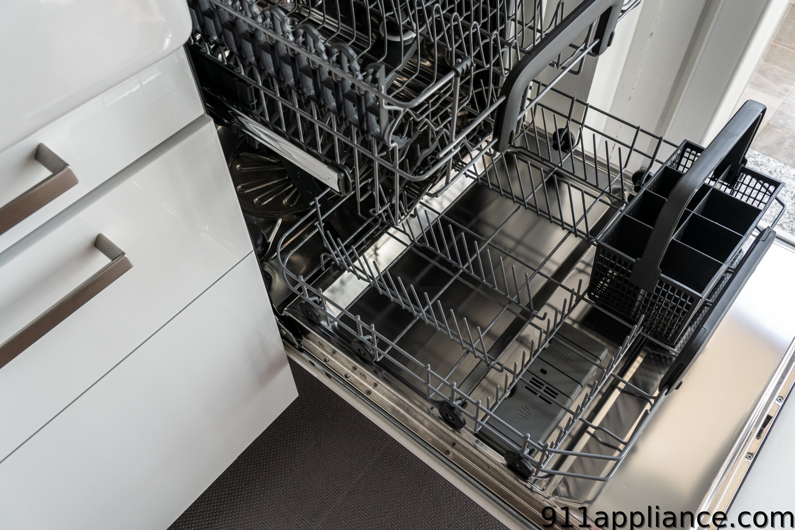 Open dishwasher racks interior view