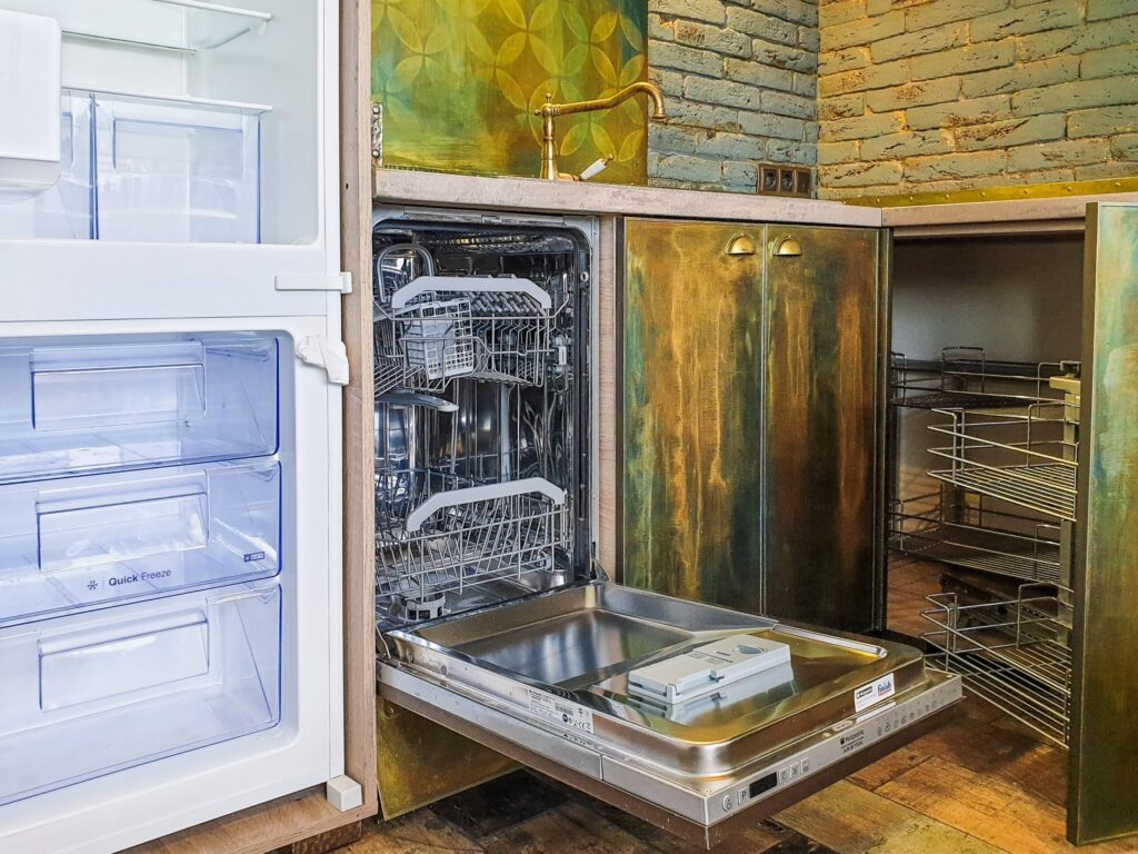 Modern kitchen appliances with dishwasher