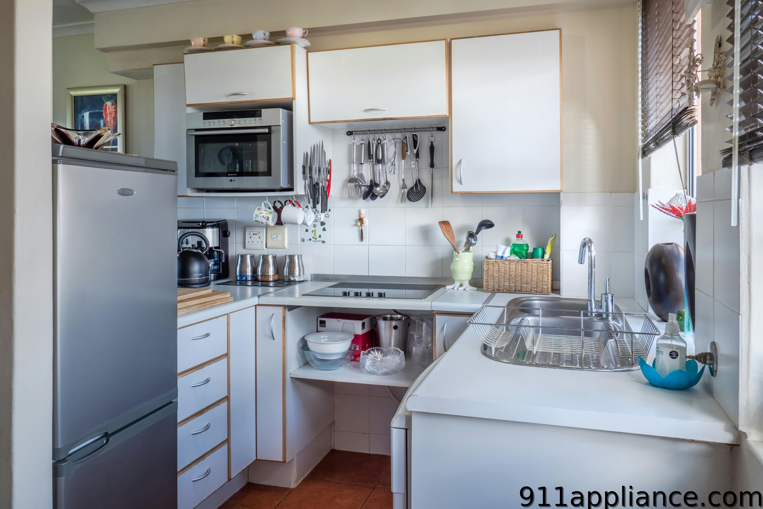 Compact kitchen with appliances.