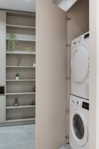 a laundry room with a washer and dryer.