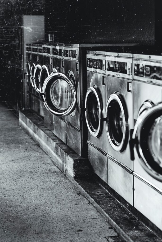 Row of washing machines.