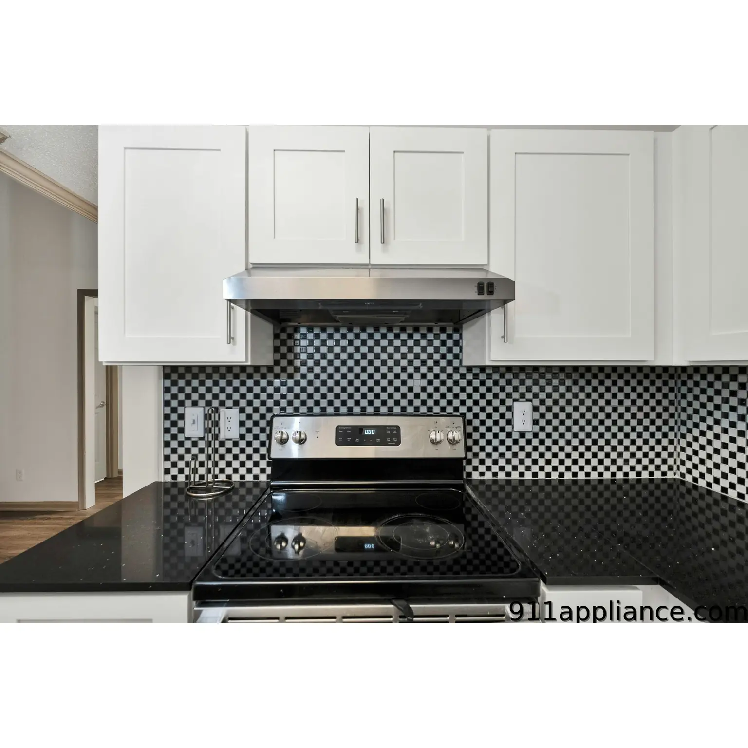 Modern kitchen with black backsplash