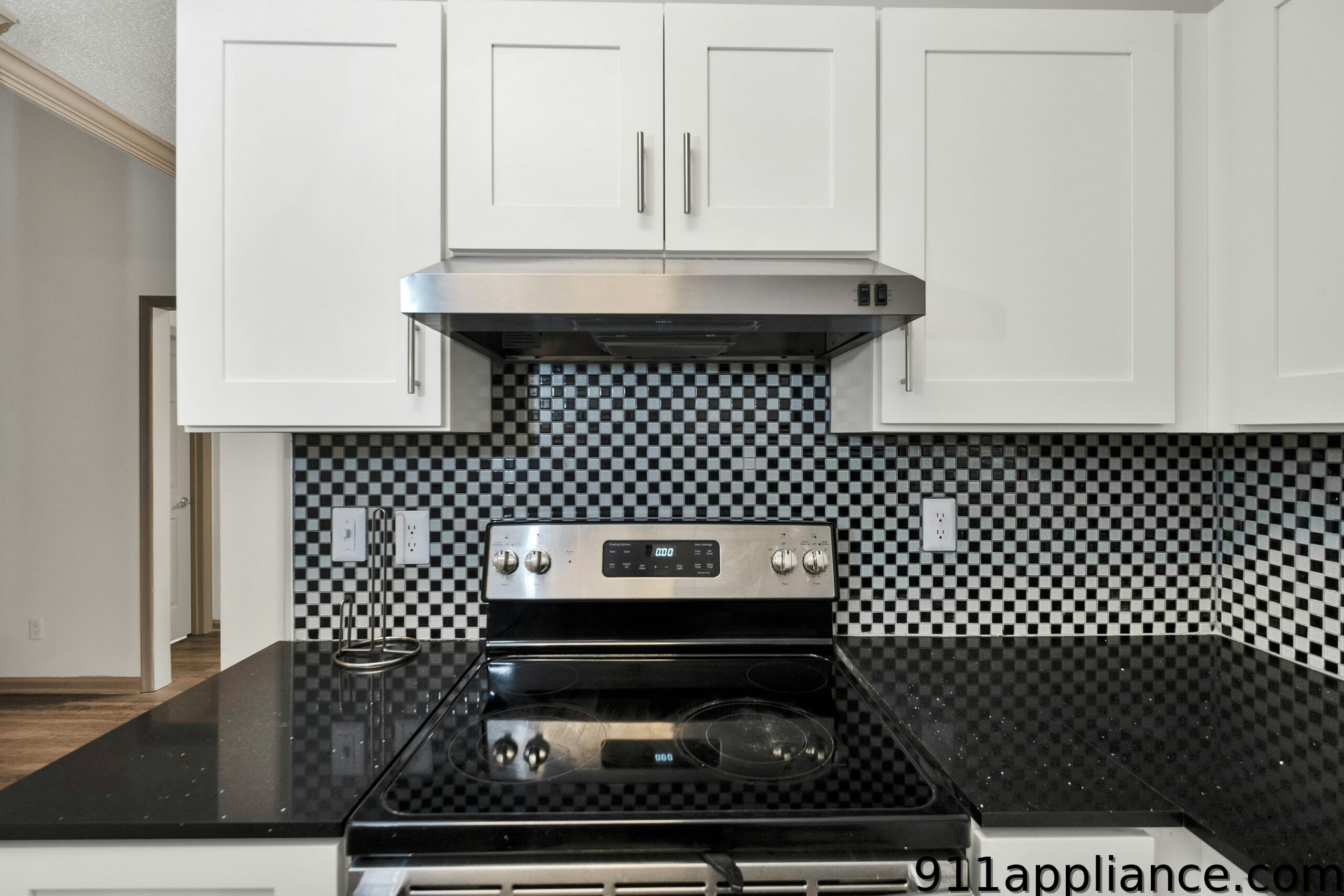 Modern kitchen with black backsplash