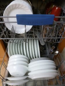 A dishwasher full of dishes.