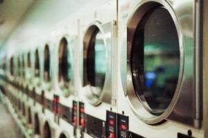 Row of commercial washing machines