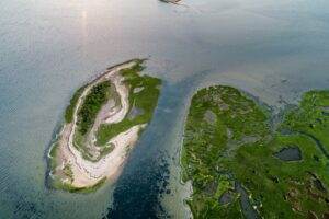 An aerial view of two islands in the water.