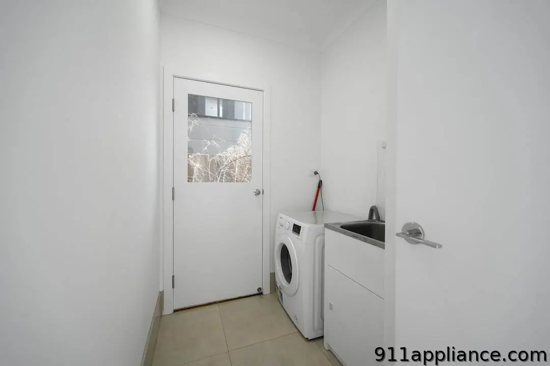 Laundry room with washing machine